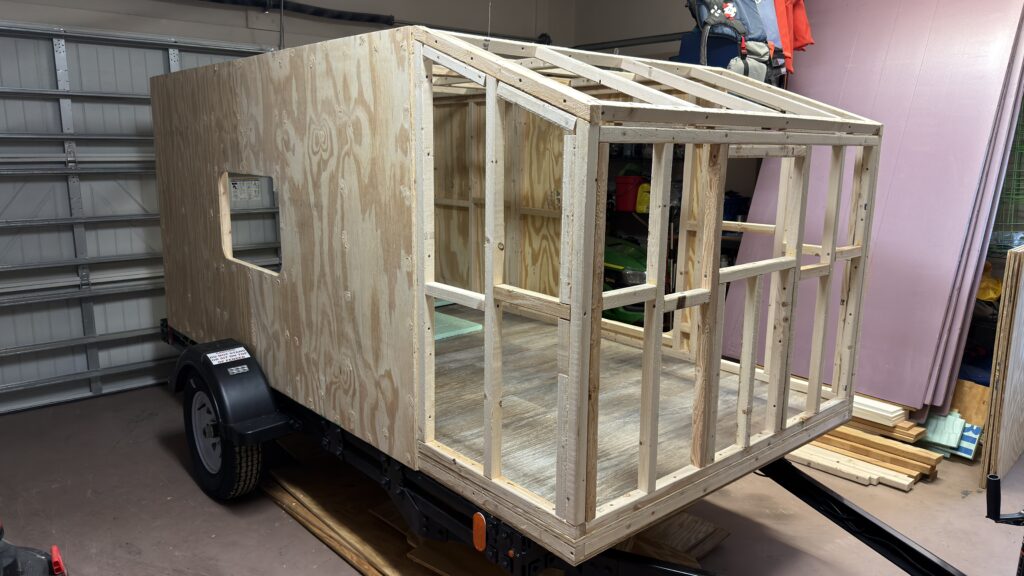 Exterior sheathing installation on our homemade camper trailer